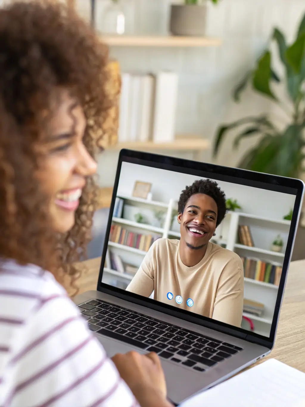 A student confidently speaking German in a virtual classroom, engaging in a lively conversation with their native-speaking instructor and classmates.
